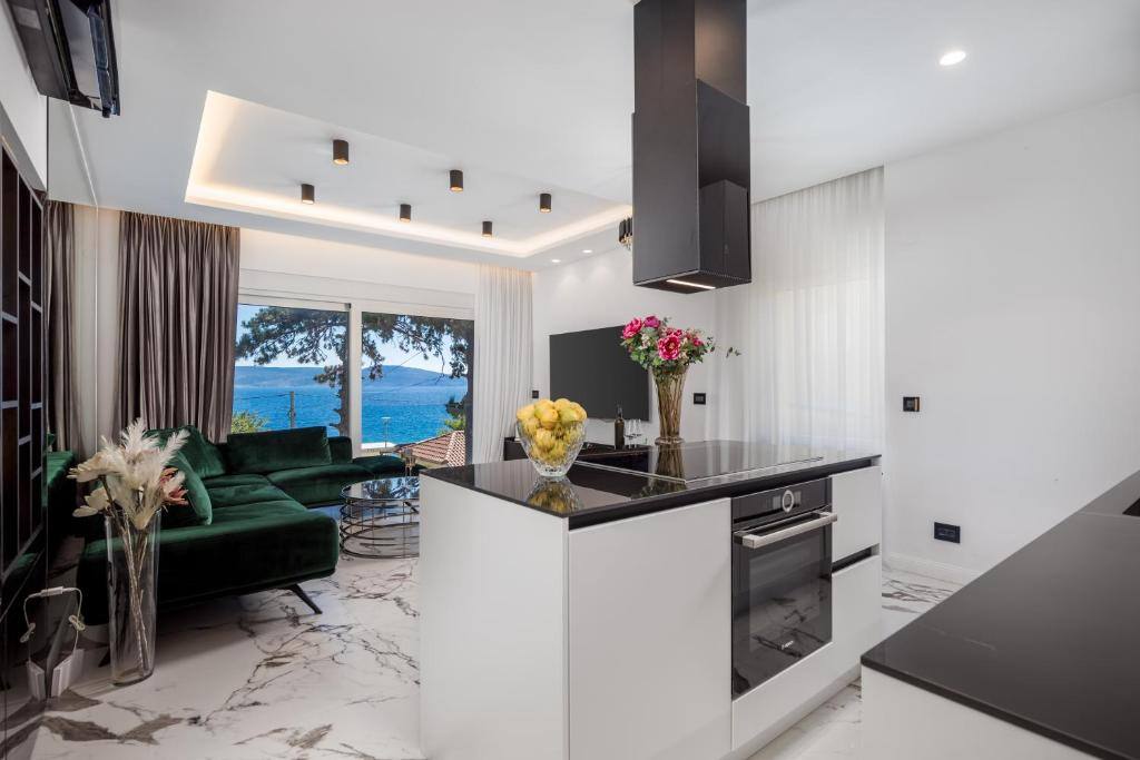 Open living room and kitchen with sea view